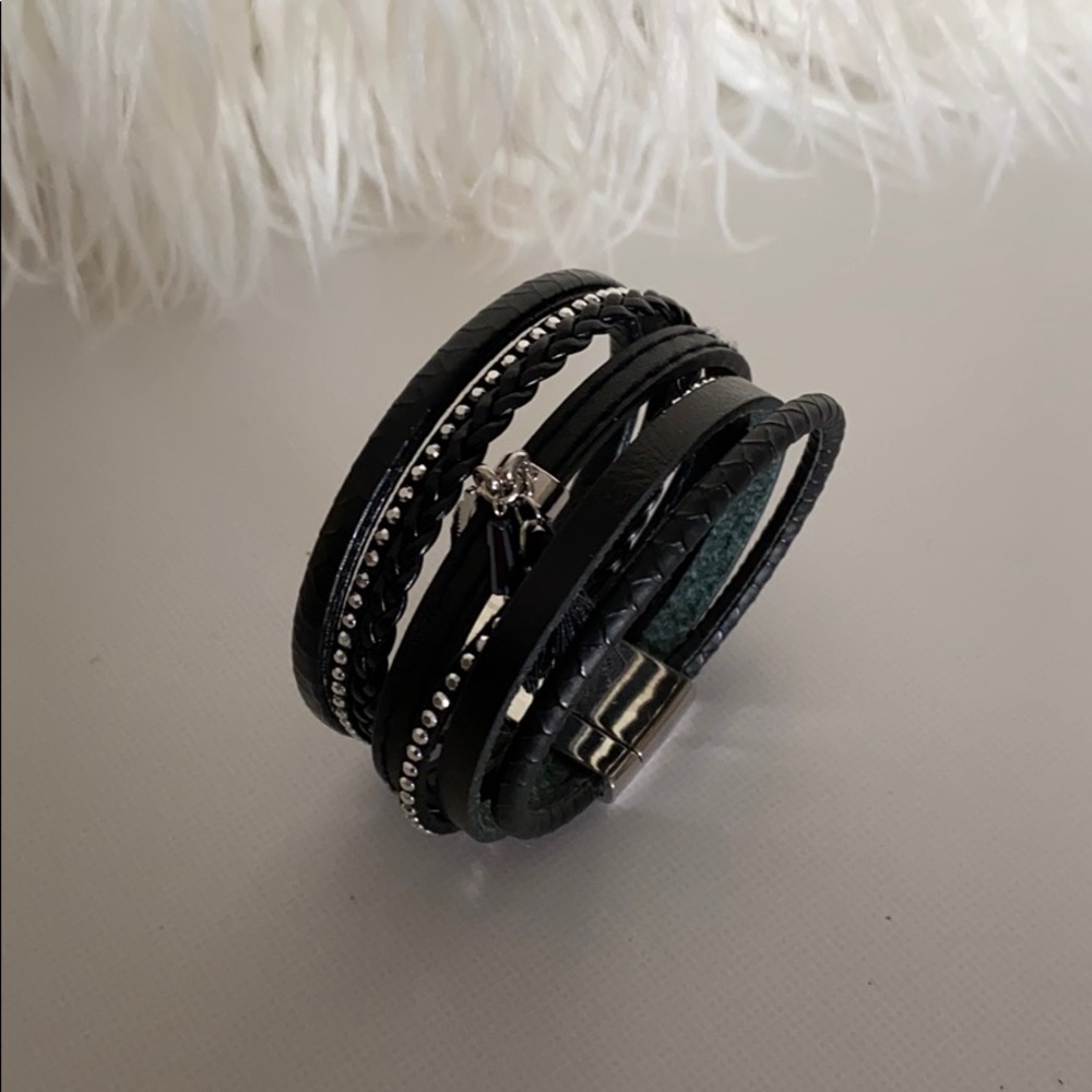 Black leather bracket with rhinestones.